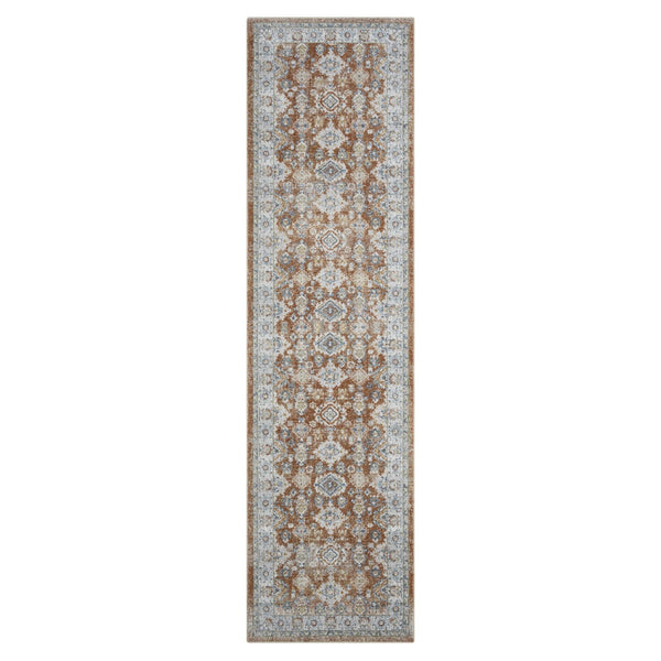 Runner rug with intricate brown and beige floral medallion pattern on a light blue-gray background.