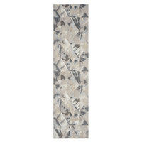 Narrow runner rug with multi-colored geometric abstract pattern in beige, gray, and black tones.