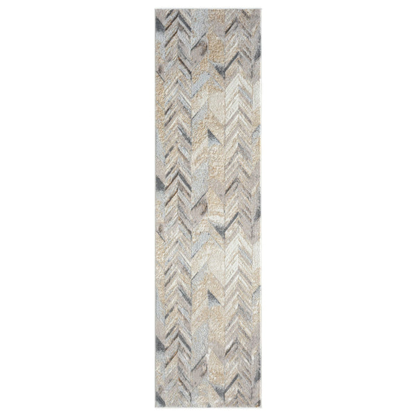 Long runner rug with multi-colored geometric chevron pattern in beige, gray, and soft blue tones.