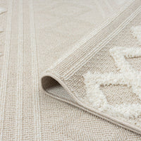 Beige and cream runner rug with textured geometric zigzag pattern and subtle stripe background.