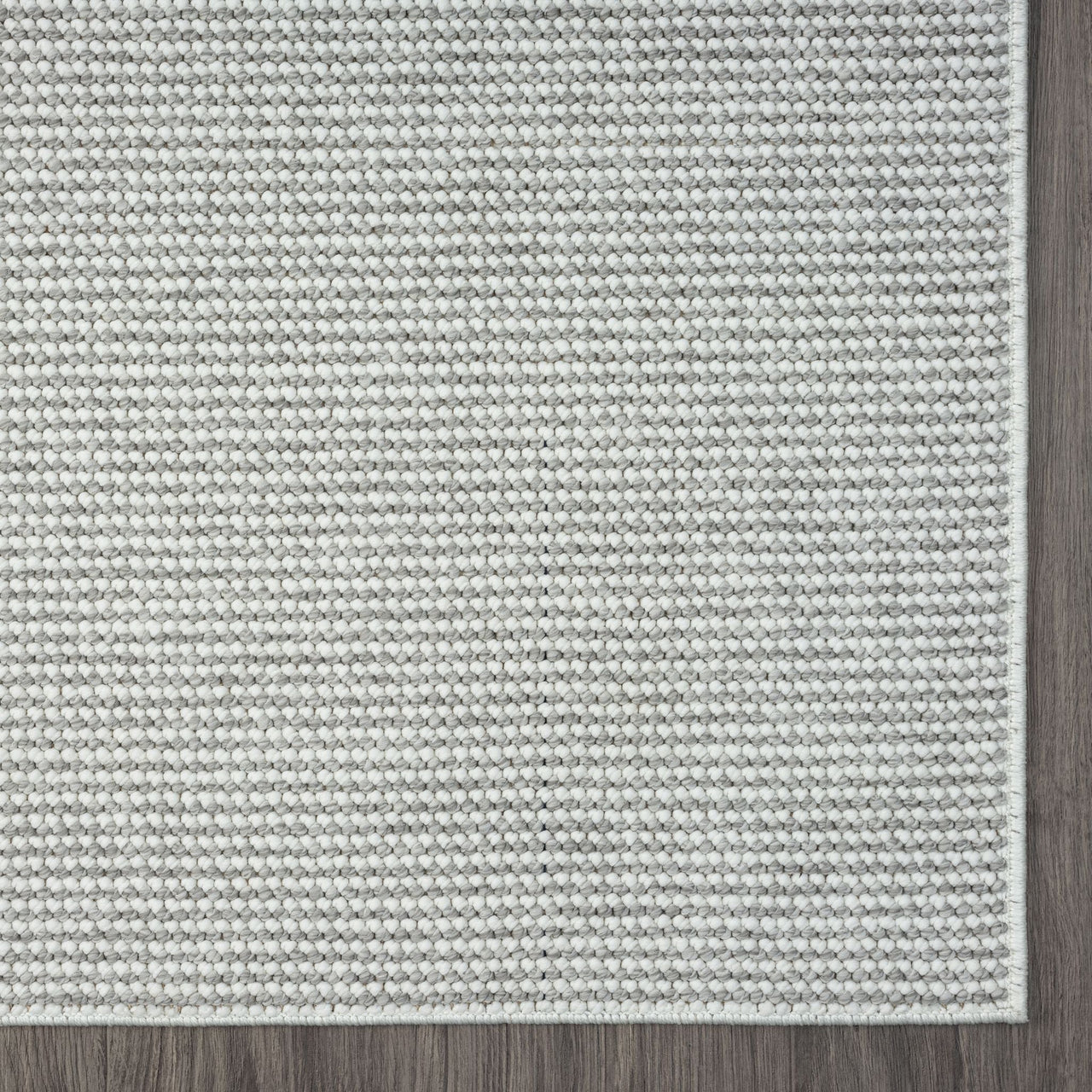 Silver grey flatweave rug with subtle textured stripes and clean edge finish.