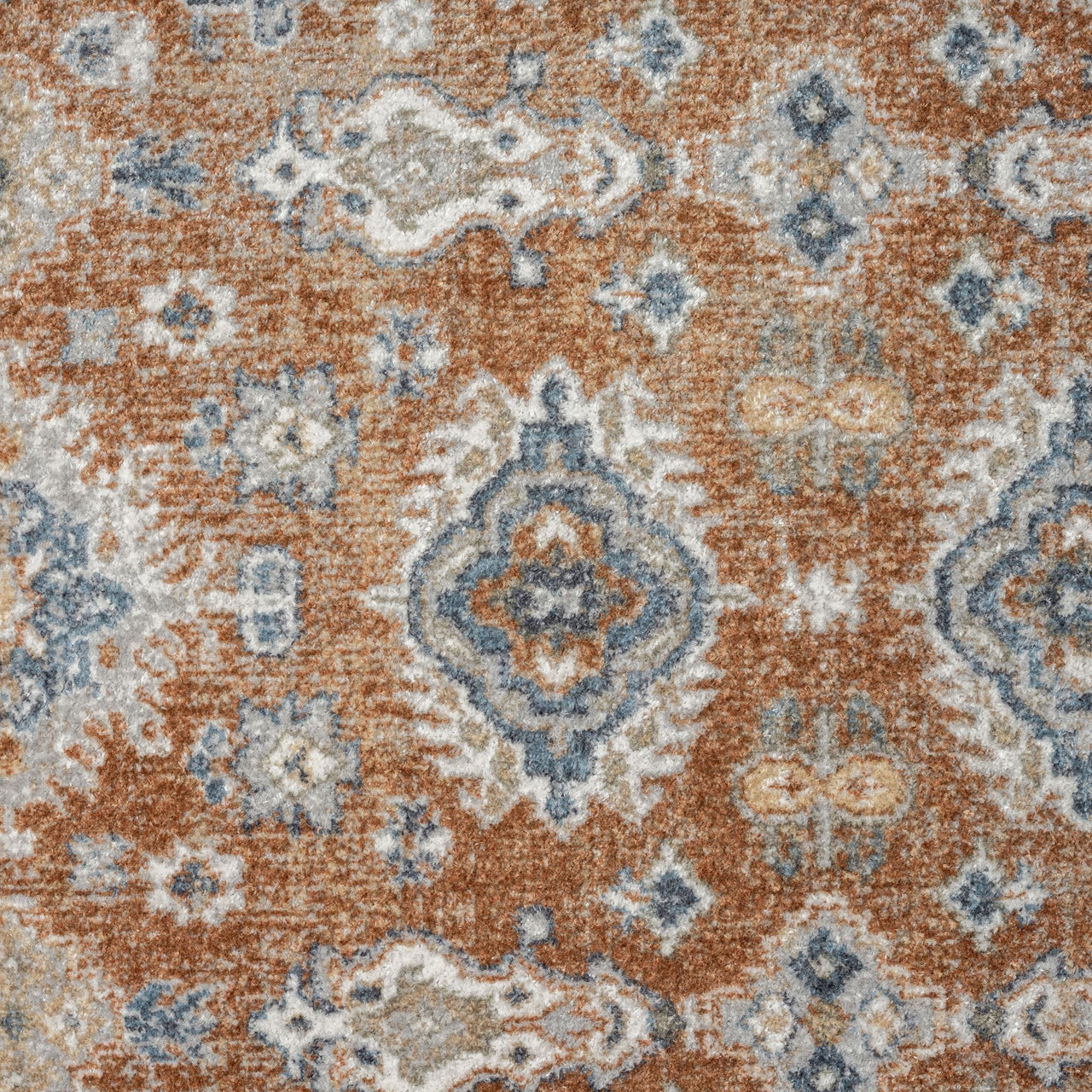 Multi-color Easy 367 Terra Runner rug with ornate blue, beige, and rust geometric pattern.