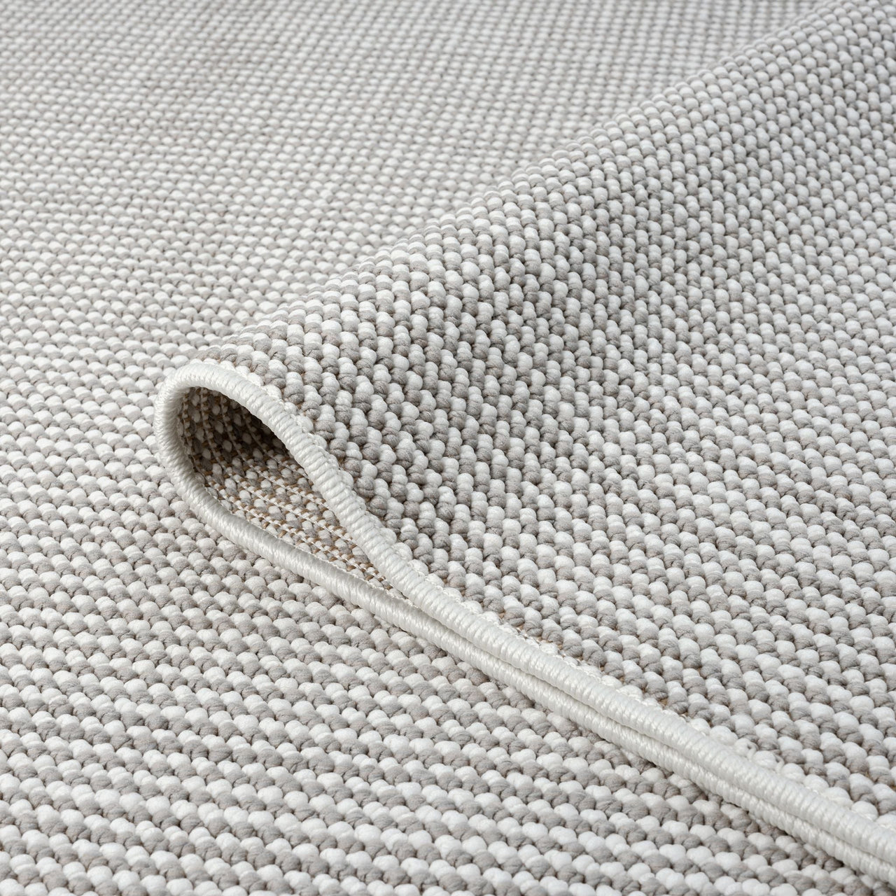 Close-up of Wiluna 4660 grey flatweave runner rug with tightly woven geometric texture.