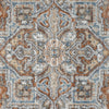 Blue multi-colored transitional rug with intricate geometric and floral patterns in gray, beige, and rust tones.