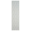 White runner rug with raised geometric diamond pattern and textured pile.