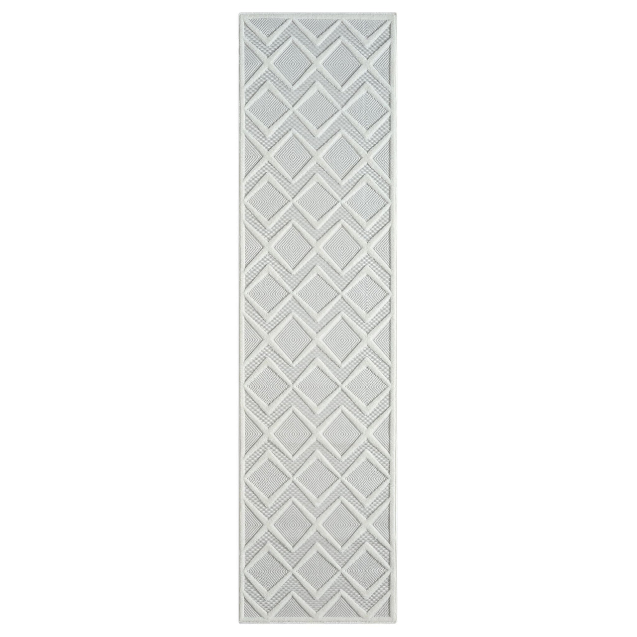 White runner rug with raised geometric diamond pattern and textured pile.