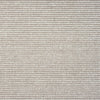Beige and cream flatweave rug with subtle geometric pattern in a minimalist modern style.