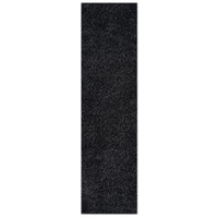 Black modern shaggy runner rug with dense plush polyester fibers and a soft texture.