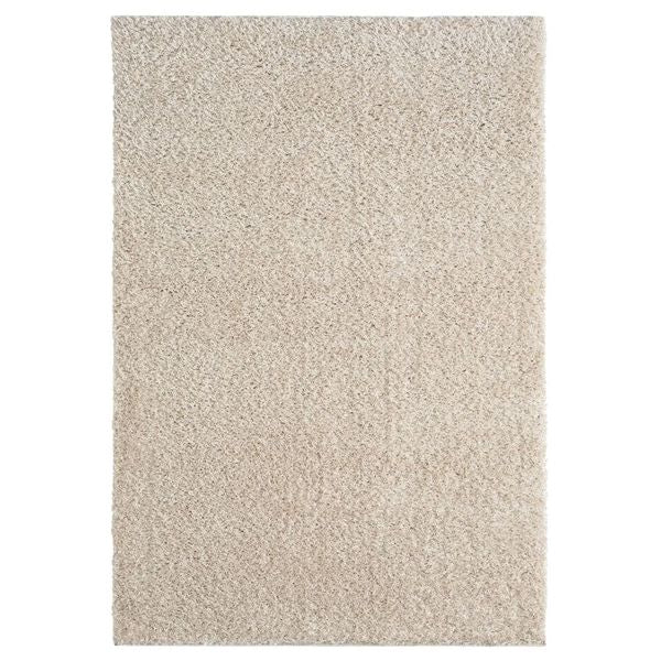 Beige modern shaggy rug with soft, plush polyester fibers and a thick pile.