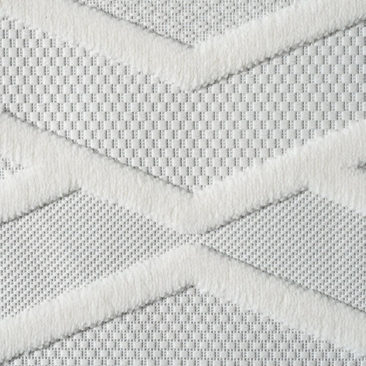 Grey and white modern rug with textured geometric diamond patterns and woven polypropylene pile.