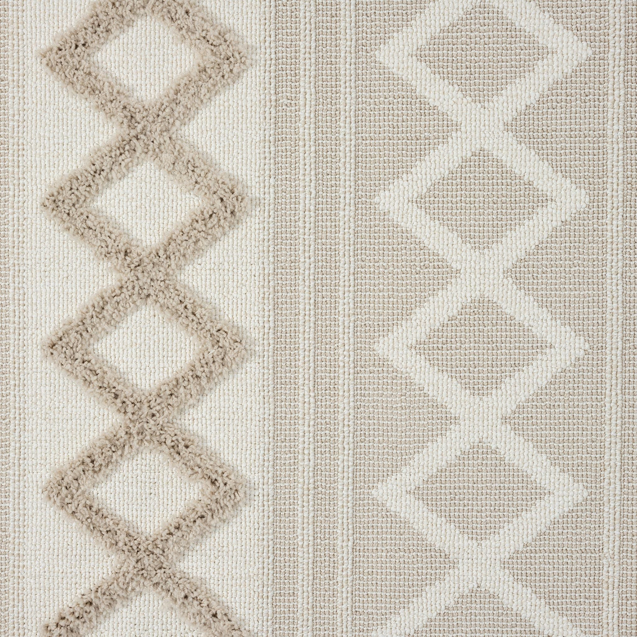 Beige and cream runner rug with textured geometric diamond patterns and fringed edges.