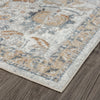 Multi-colored transitional rug with muted blue, beige, and rust floral pattern and textured pile.