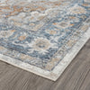 Blue and beige transitional rug with ornate floral and geometric patterns on a wooden floor.