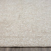Taupe flatweave runner rug with subtle textured geometric pattern in woven polyester.