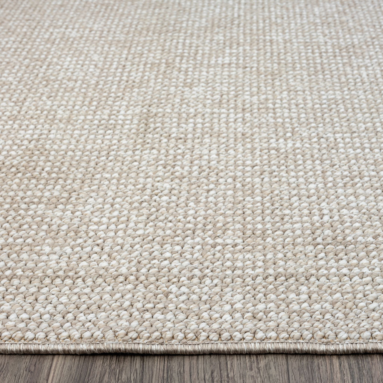 Taupe flatweave runner rug with subtle textured geometric pattern in woven polyester.