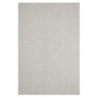 Beige flatweave rug with subtle woven texture and minimalist modern design.