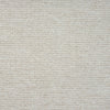 Beige flatweave rug with subtle textured pattern in a minimalist modern style.