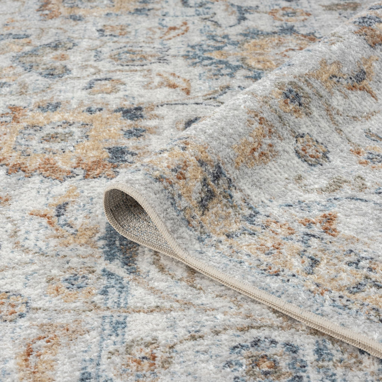 Multi-color Easy 368 Pearl Runner rug with soft blue, beige, and gold transitional pattern on plush pile.