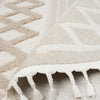 Beige and cream round rug with geometric patterns and tasseled fringes.