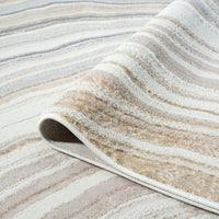 Close-up of a textured rug with wavy pattern