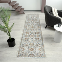 Modern pearl-colored runner rug with intricate geometric and floral patterns in neutral tones on light hardwood floor.