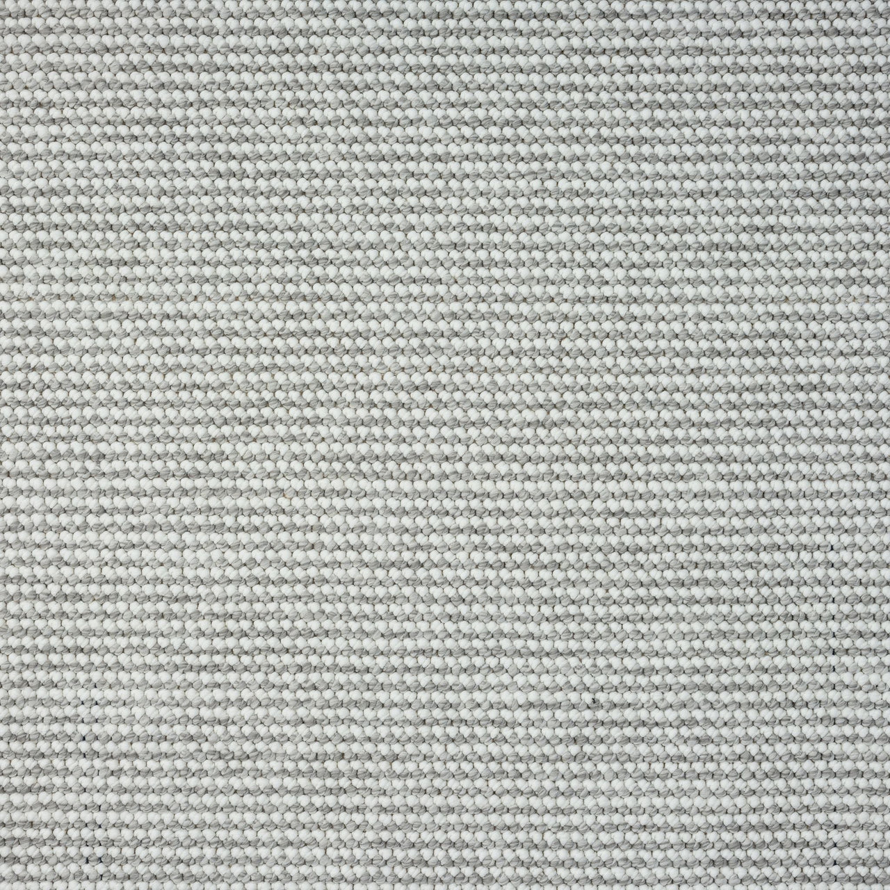 Silver grey flatweave rug with subtle textured pattern and matte finish.