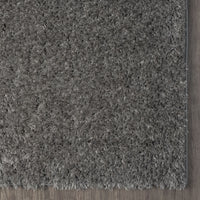 Grey and silver modern shaggy rug with plush polyester fibers and clean edges.