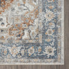 Close-up of Aqua Runner rug corner with blue, orange, and gray floral and geometric patterns on a textured surface.