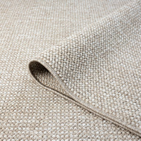 Taupe flatweave rug with tight, textured geometric weave in neutral tones.