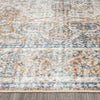 Modern runner rug with coral, beige, and blue abstract pattern and soft texture.