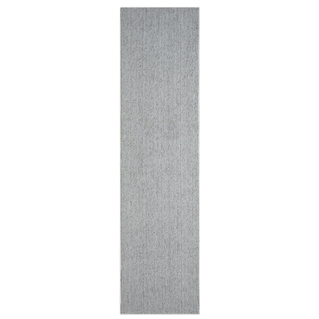 Long grey flatweave runner rug with subtle geometric pattern and minimalist design.