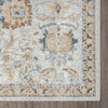 Soft pearl-colored runner rug with intricate floral and geometric patterns in muted blue and gold tones.