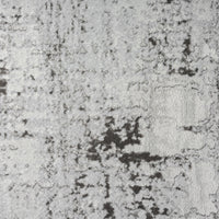 Close-up of a gray and black abstract modern rug