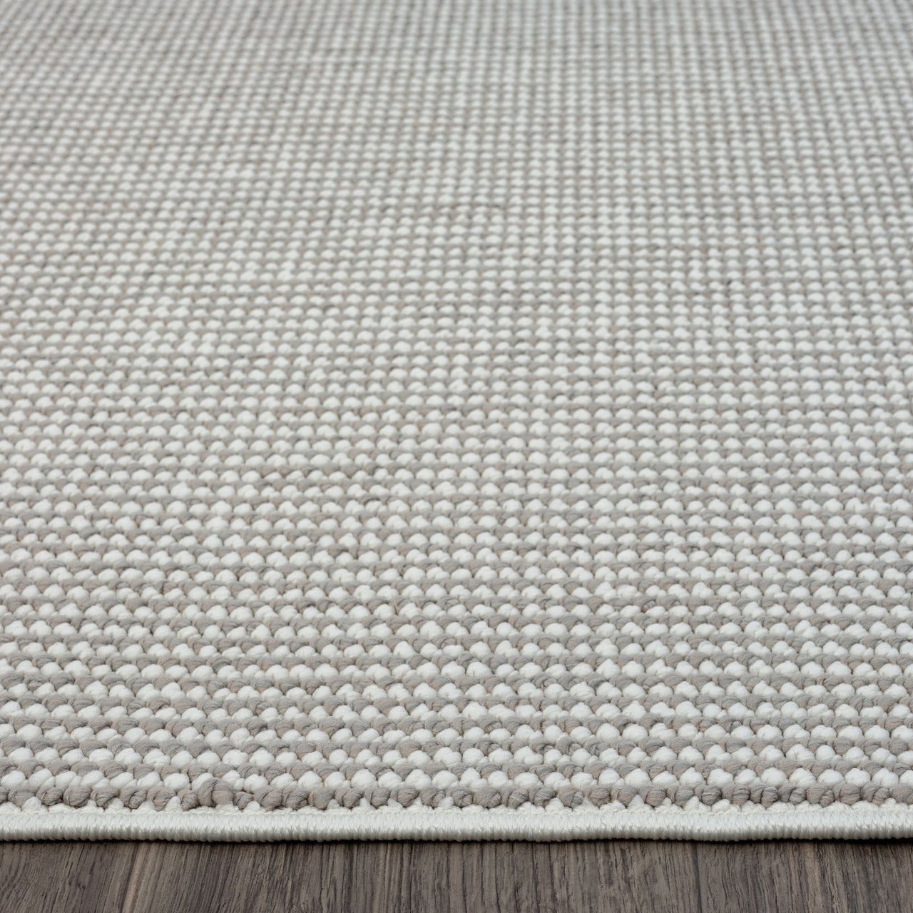 Grey flatweave runner rug with subtle textured geometric pattern and clean edge stitching.