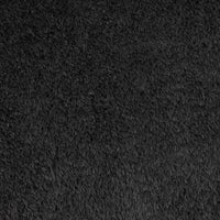 Black modern shaggy rug with dense, textured polyester fibers and a plush surface.