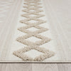 Beige and cream runner rug with raised geometric diamond pattern and subtle textured pile.