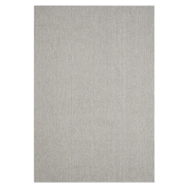 Beige flatweave rug with subtle geometric pattern and textured modern design.