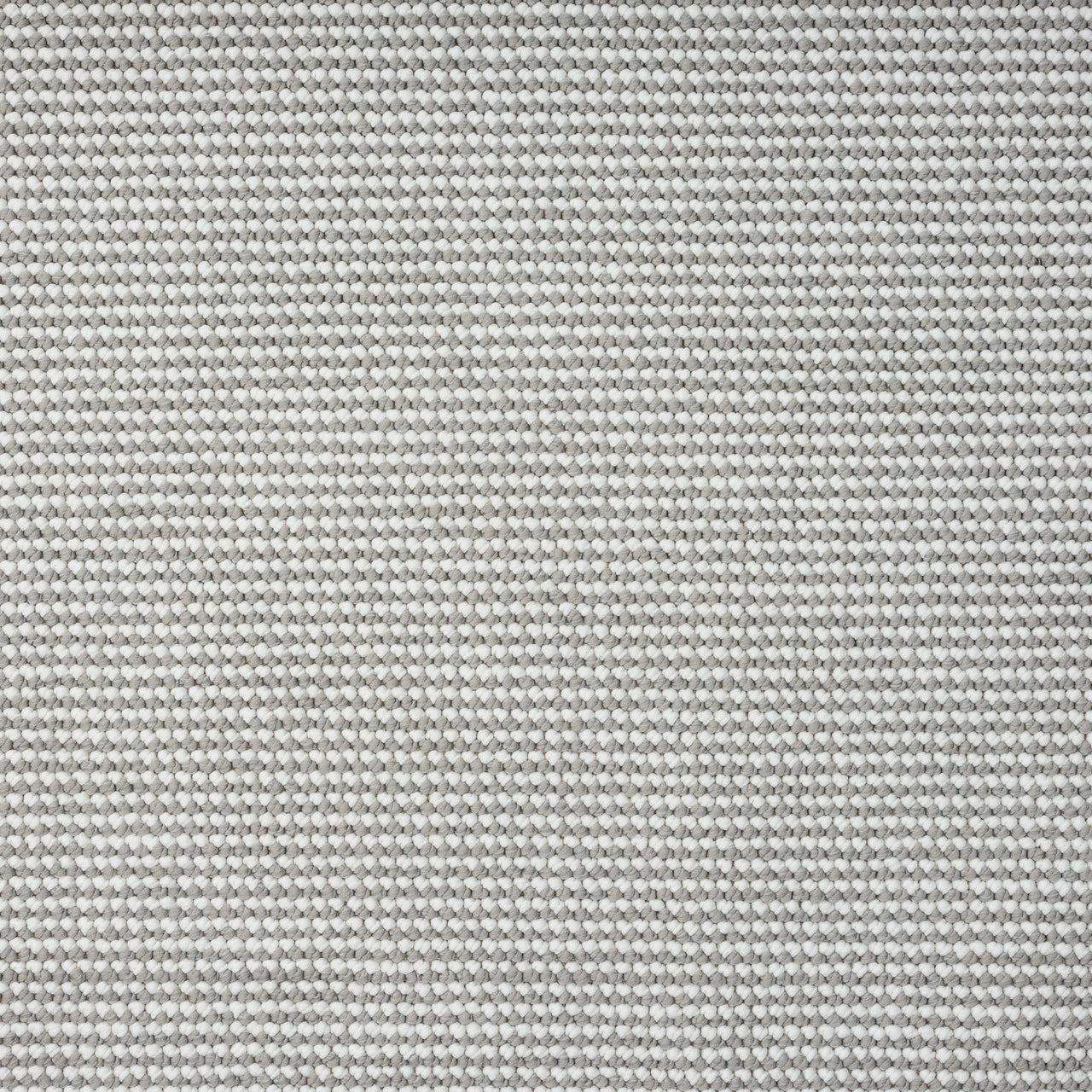 Grey flatweave rug with subtle geometric texture and minimalist design.