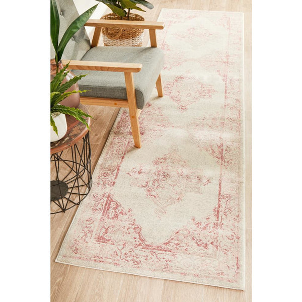 Rose beige transitional runner rug with soft pink intricate patterns on light background.