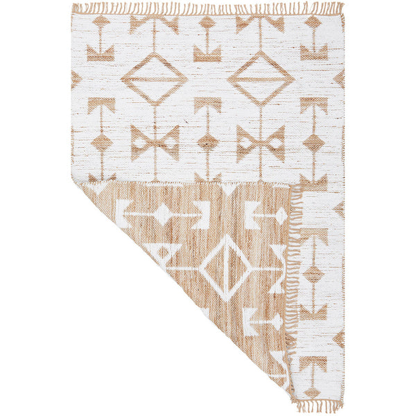 Reversible flatwoven rug with natural beige and white abstract geometric pattern and fringed edges.