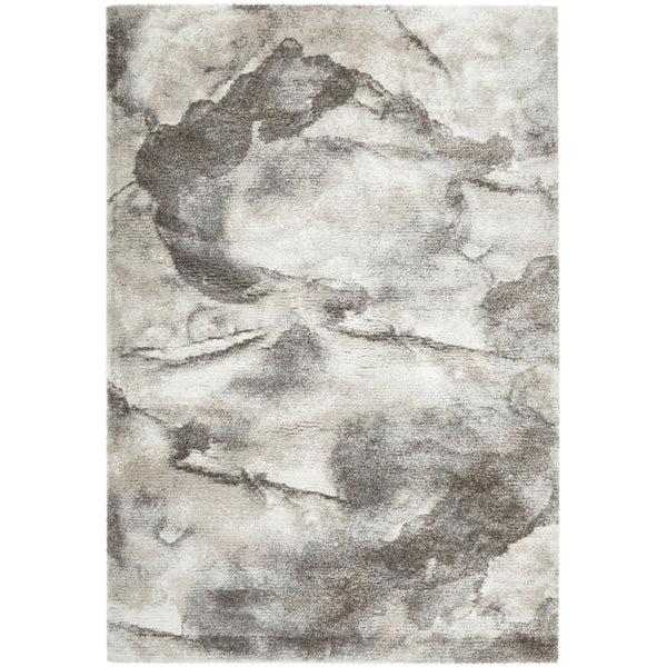 Multi-colored modern shag rug with abstract gray and beige pattern, soft texture.