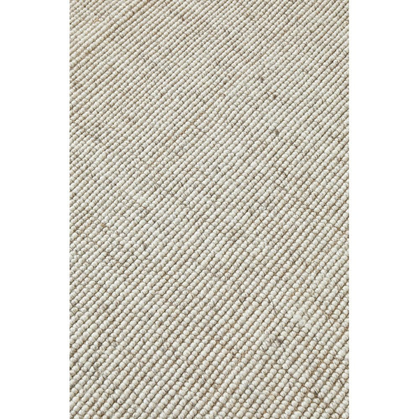 Beige wool and jute hand-loomed rug with subtle diagonal striped pattern.