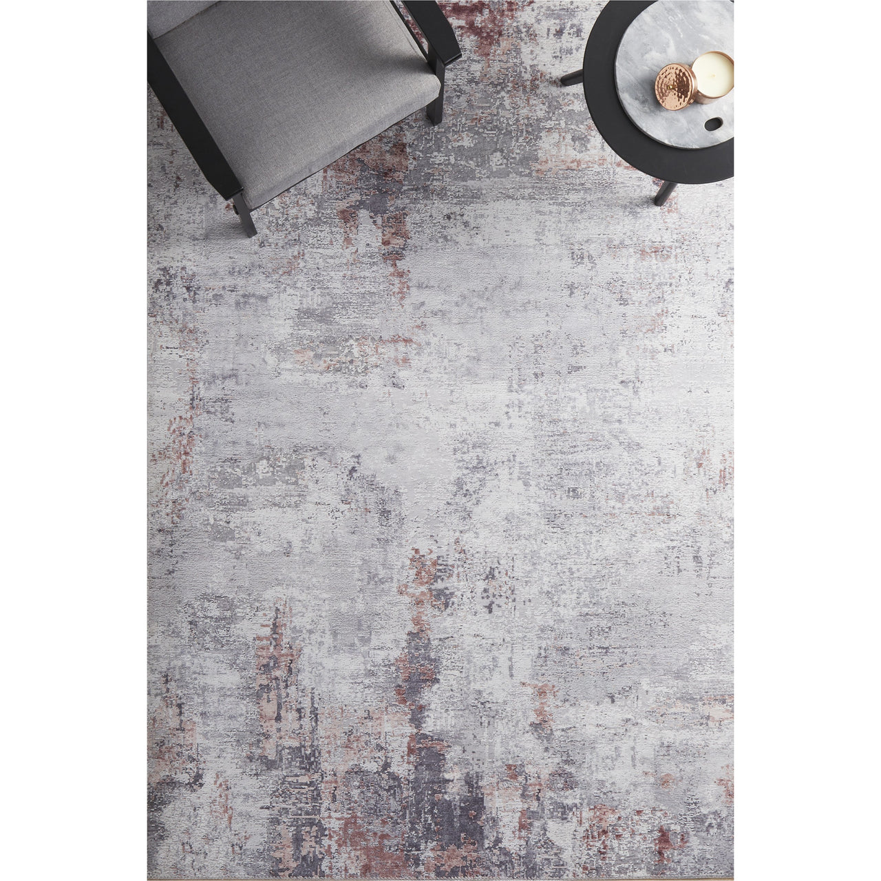 Blush and grey transitional rug with abstract textured pattern and soft polyester pile.