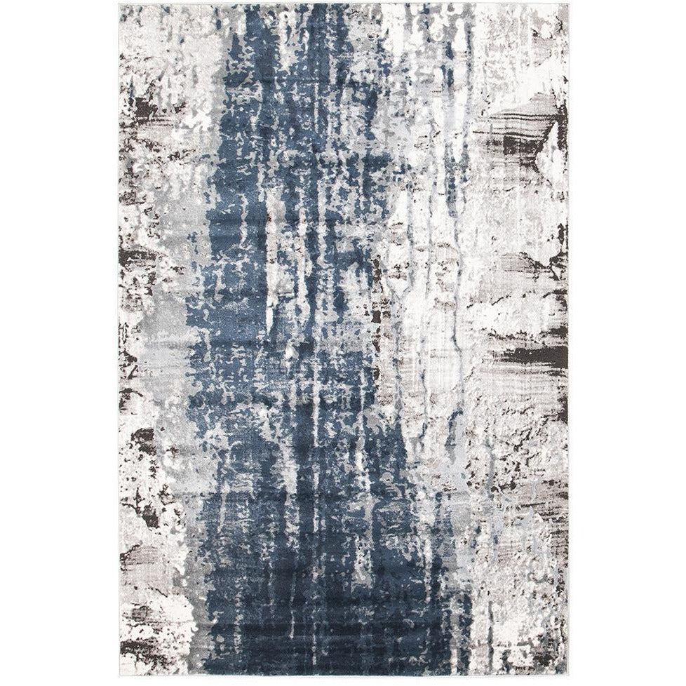 Blue, beige, and grey abstract patterned modern rug with textured, distressed design.