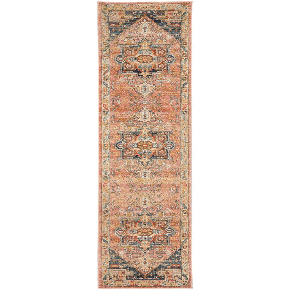 Multi-color transitional runner rug with tribal-inspired patterns in orange, blue, and beige tones.
