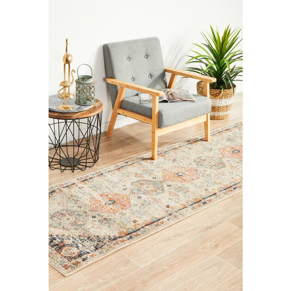 Multi-color autumn-toned transitional runner rug with tribal-inspired patterns on light background.
