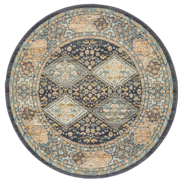 Round transitional rug with navy, beige, and light blue tribal pattern and subtle distressed texture.