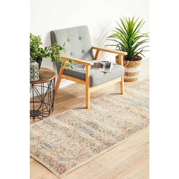 Multicolor transitional runner rug with subtle tribal patterns on light background in modern living space.