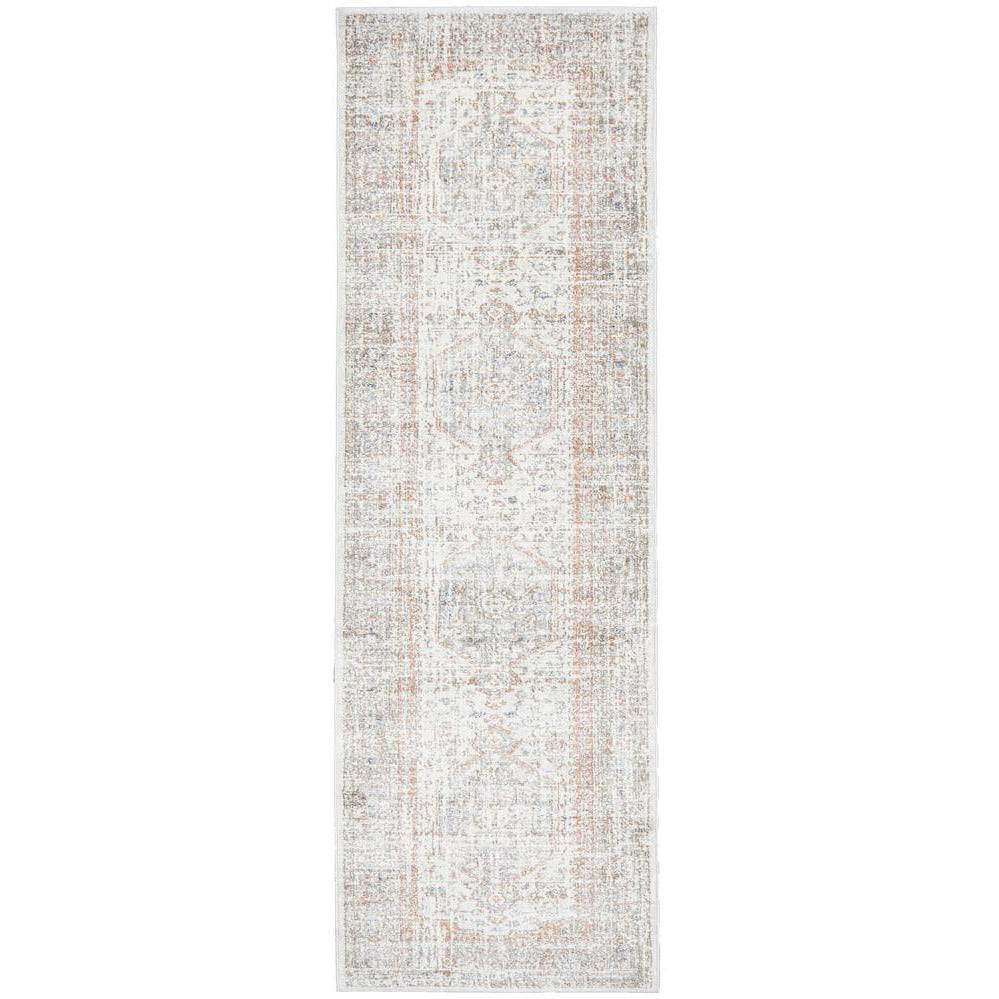 Transitional runner rug with silver grey, soft blue, and warm peach medallion pattern on light background.