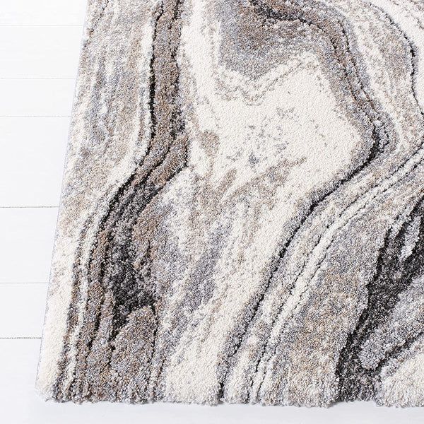 Plush modern rug with multi-colored grey and light neutral wave patterns on a soft pile.